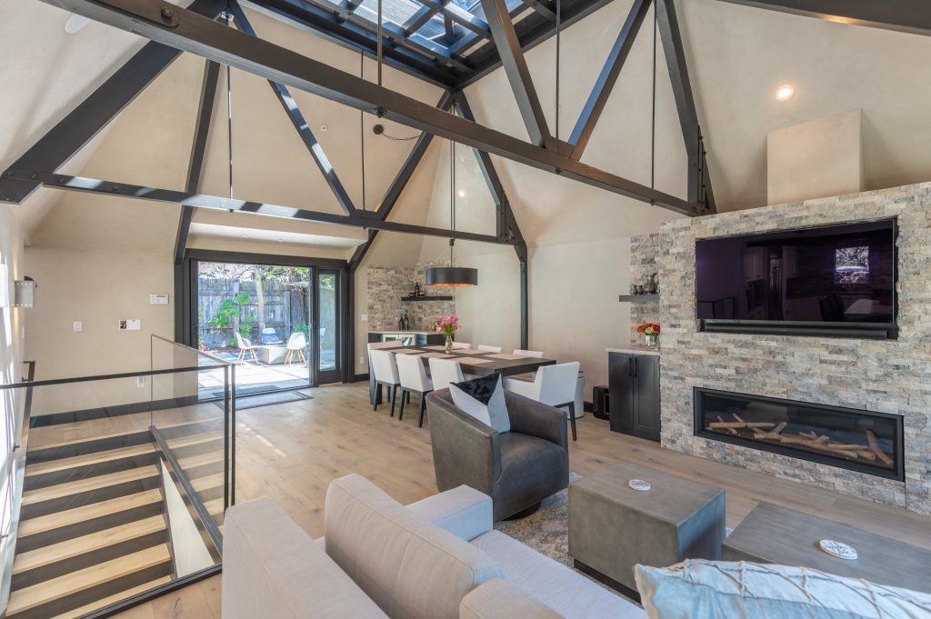 Vaulted wood-ceiling living room in the remodeled Murphy Bungalow, Carmel